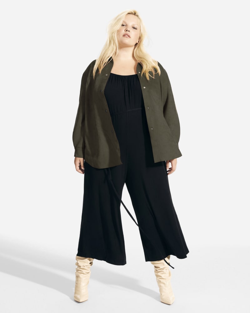 Front of a model wearing a size 1X Saphira Faux Suede Shacket in Olive Green by Truth. | dia_product_style_image_id:252695